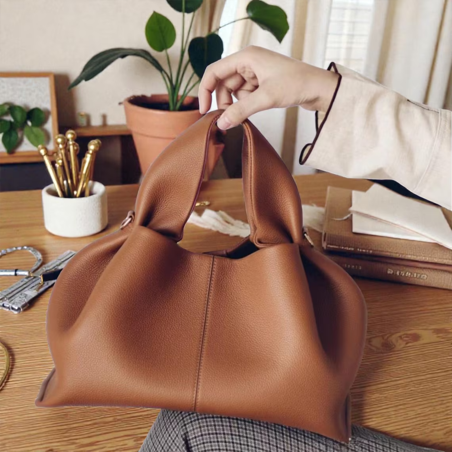 Multi-Tone Soft Grain Draped Dumpling Shoulder Bag With Integrated Looped Top Grips And Polished Golden Side Ring Hardware