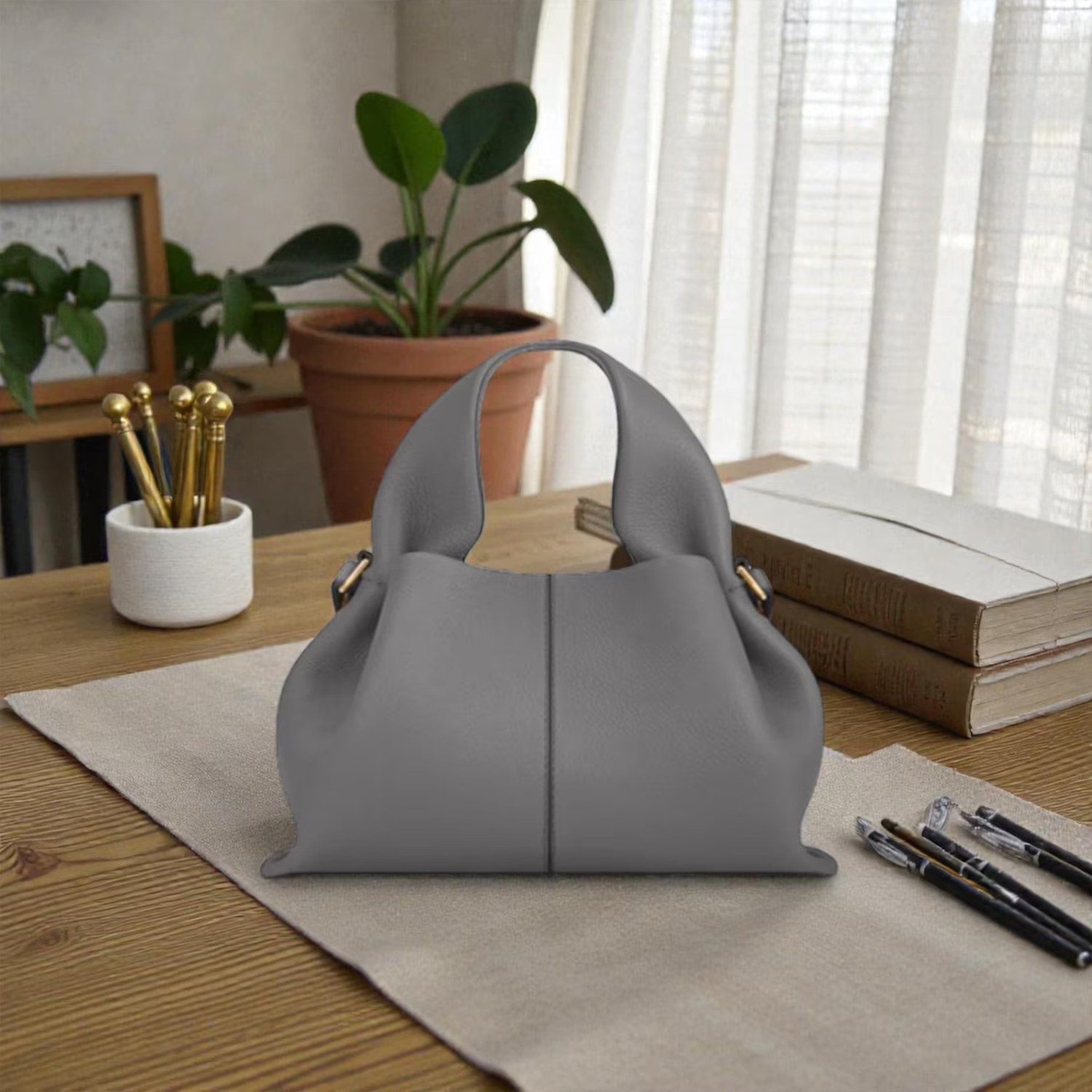 Multi-Tone Soft Grain Draped Dumpling Shoulder Bag With Integrated Looped Top Grips And Polished Golden Side Ring Hardware